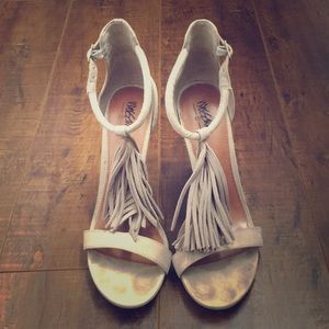 Taupe suede heels with fringe